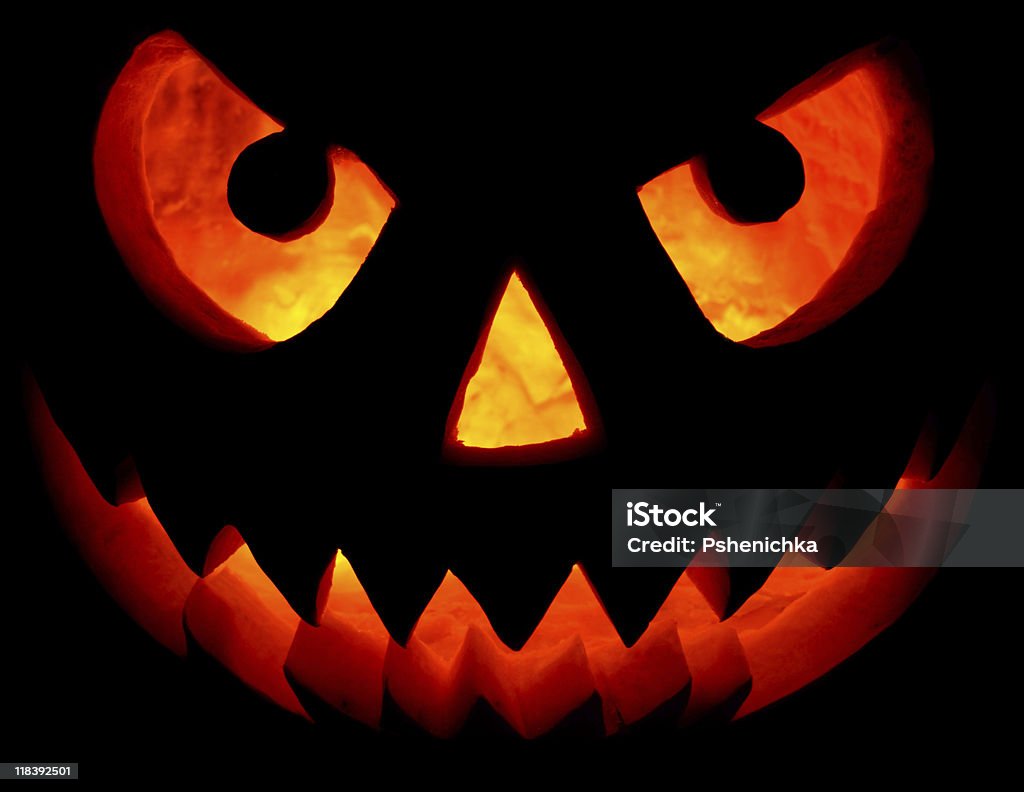 Halloween Zucca su nero - Foto stock royalty-free di Zucca di Halloween