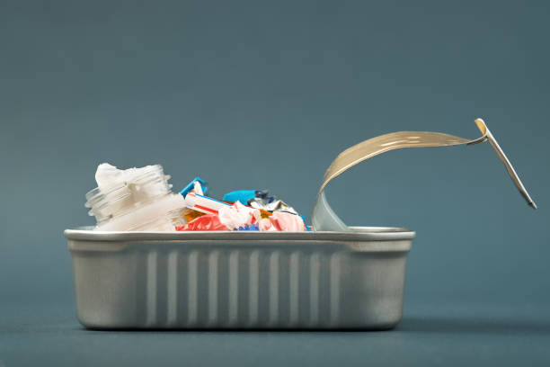 istock Open tin can. Plastic waste instead of fish inside. Ocean plastic pollution concept 1183927506
