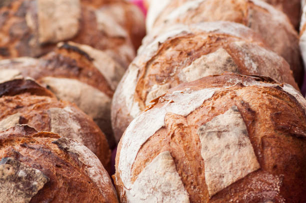 istock traditional bread pile at the market 1183927593