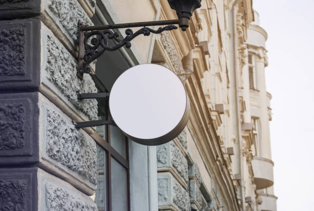 istock Blank white round box on architectural building mock up 1183927632
