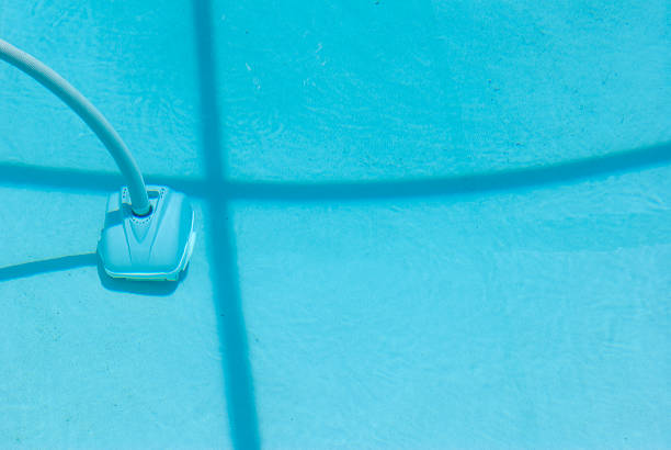 istock Pool vacuum at bottom of swimming pool 118392876