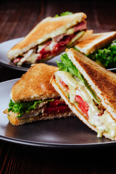 istock Sandwich bread tomato, lettuce and yellow cheese 1183929254