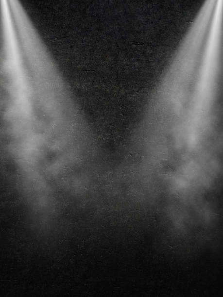 istock 3D grunge interior with smoky spotlights 1183929656