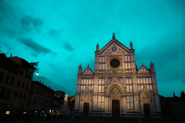 Florence city, Firenze architecture in Italy. Santa Maria del Fiore Cathedral, Duomo huge domes and walls as part of night cityscape from the hill above the city