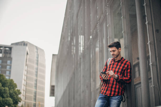 istock Hipster man talking on the mobile phone 1183932392