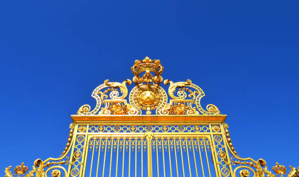 Closeup of Versailles Palace gate with crown stock photo