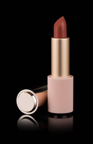 istock Red matt lipstick isolated on black background 1183935595