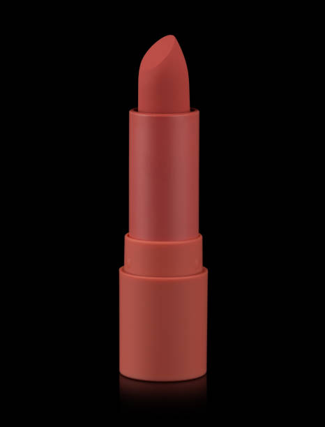 istock Red matte lipstick isolated on black 1183936142