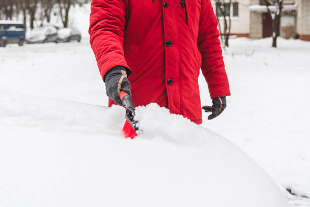 istock after blizzard car covered with snow cleaning concept 1183936203