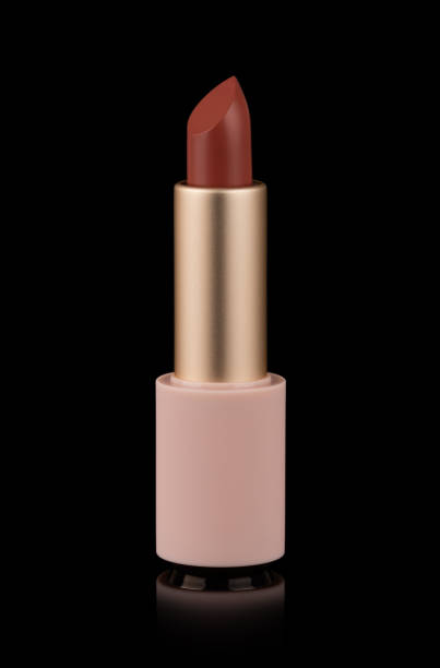 istock Red matte lipstick isolated on black 1183936223