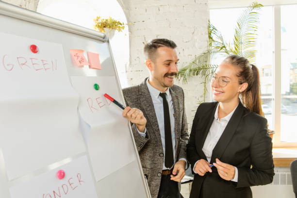 istock Young business professionals having a meeting, creative office 1183939749