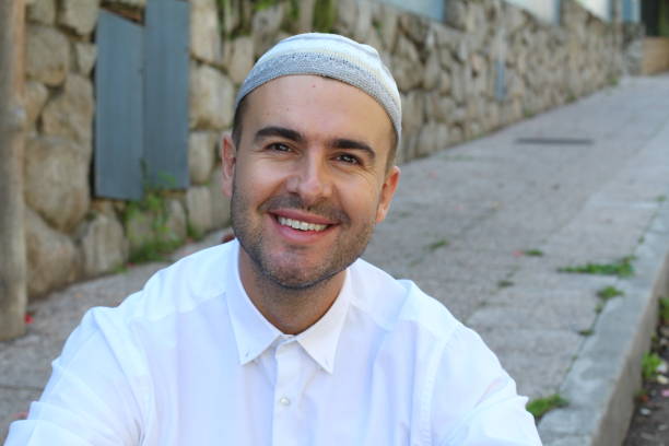 istock Cheerful Islamic man smiling at camera 1183940596