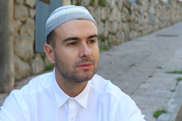 istock Handsome Islamic man looking away 1183940619