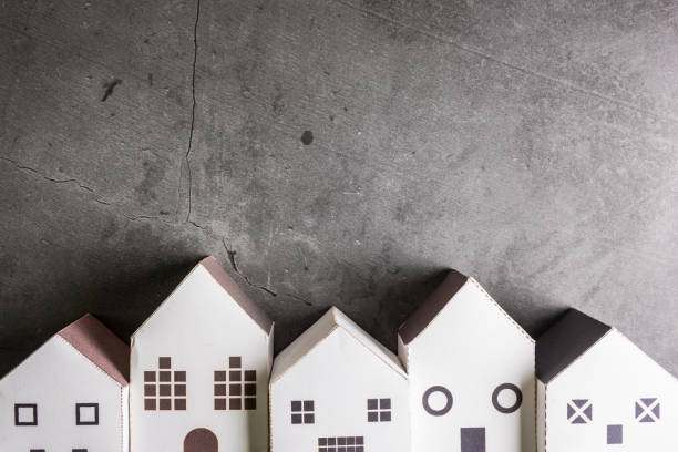 istock Paper house and construction tools on stone pattern background with copy space.Home Repair concept, Repair maintenance concept, Renovation concept. 1183943003