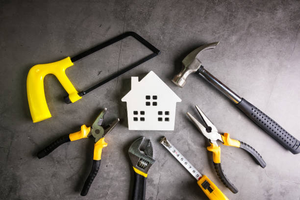 istock Wooden house and construction tools on stone pattern background with copy space.Home Repair concept, Repair maintenance concept, Renovation concept. 1183943419
