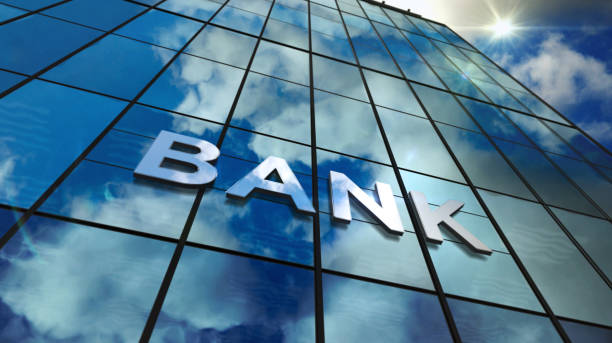 istock Bank glass skyscraper with mirrored sky 1183943506