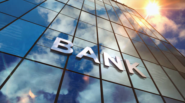 istock Bank glass skyscraper with mirrored sky 1183943639