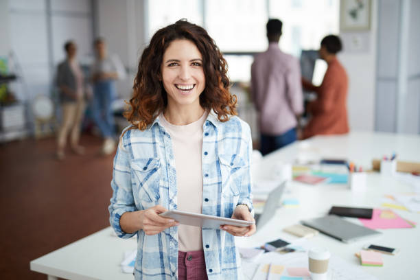 istock Creative Businesswoman Smiling at Camera 1183945638