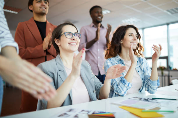 istock Group of Business People Clapping 1183945643