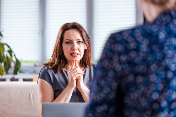 istock Mature female professional planning in office 1183947489