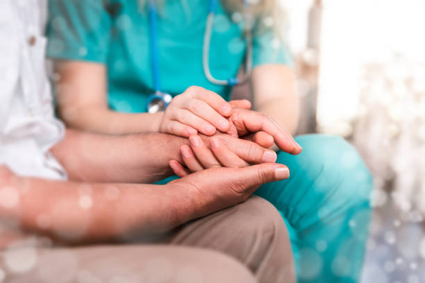 istock Doctor Comforting a Senior Man 1183948293