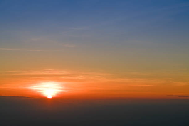 istock Aerial view dramatic sunset and sunrise sky nature background with white clouds 1183948363