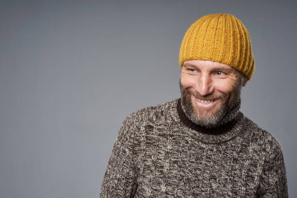 istock Happy laughing mature man in warm sweater 1183948428