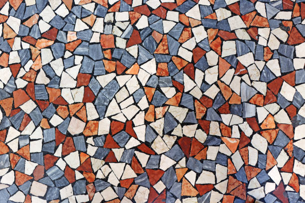 istock Mosaic flooring of multicolored small stones 1183948635