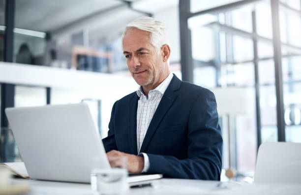 istock Working on more plans for his empire 1183952267