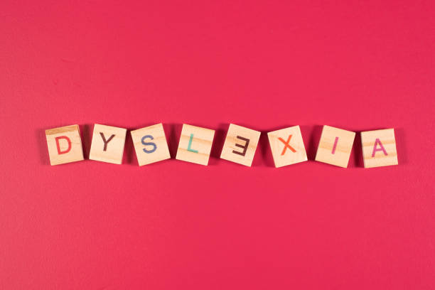 istock High Angle View Of Toy Blocks On Red Background 1183954108