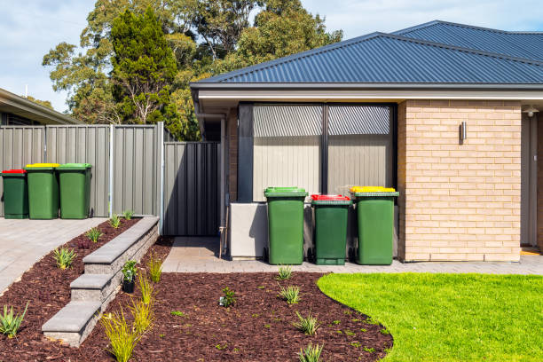 istock Home waste wheelie bins set on front yard 1183954668