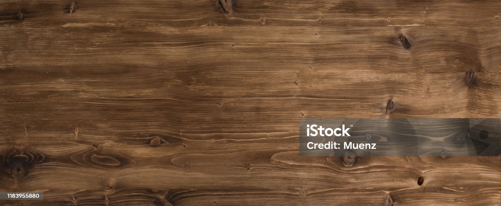 Brown smooth wood surface Brown smooth rustic wood surface for a background Wood - Material Stock Photo