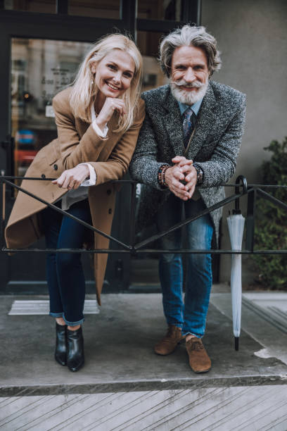 istock Happy adult couple is posing on camera 1183955917