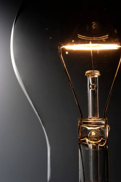 istock Close-up of illuminated light bulb against gradation background 118395608