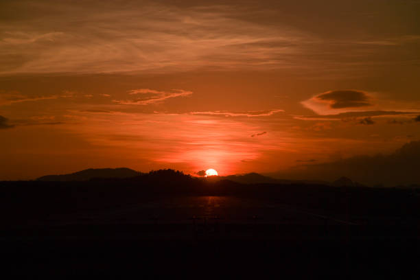 istock Aerial view dramatic sunset and sunrise sky nature background with white clouds 1183956092