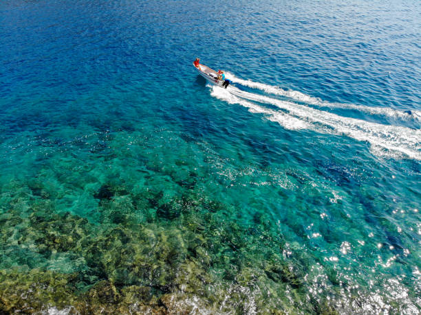 istock Boat tour on the beach. 1183956146