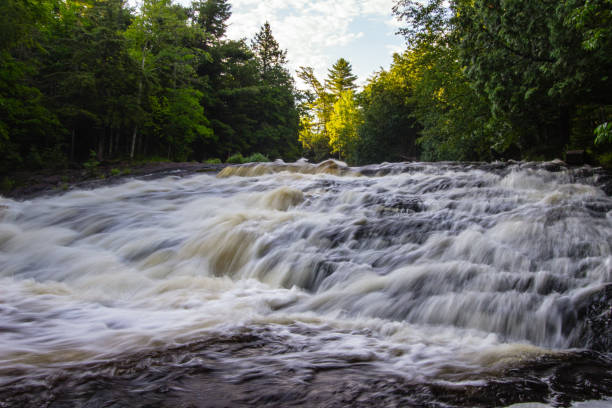 istock Panoramic Michigan Waterfall Background Of Upper Bond Falls 1183956576