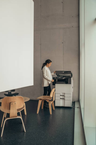istock Pregnat woman working at the office 1183956606