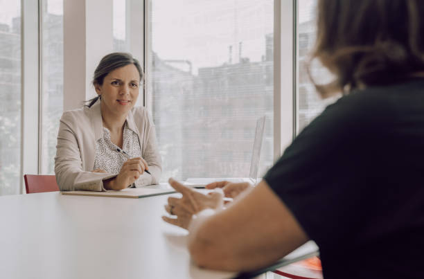 istock Pregnat woman working at the office 1183956932