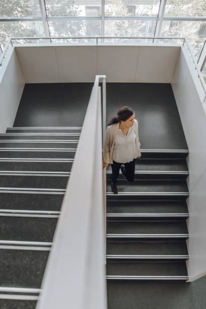 istock Pregnat woman working at the office 1183957070
