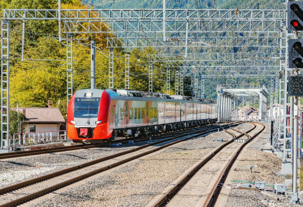 istock Passenger train approaches to Roza Khutor railway station. Caucasus. Russia. 1183958498