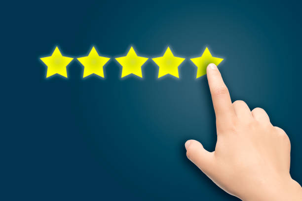 istock Hand of a client determining the rating of services according to a five-point system 1183959810