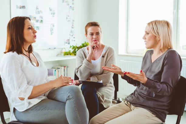 istock Professional listening to woman sharing problems 1183961149