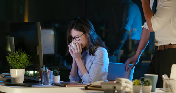 istock businesswoman sick while working 1183961406
