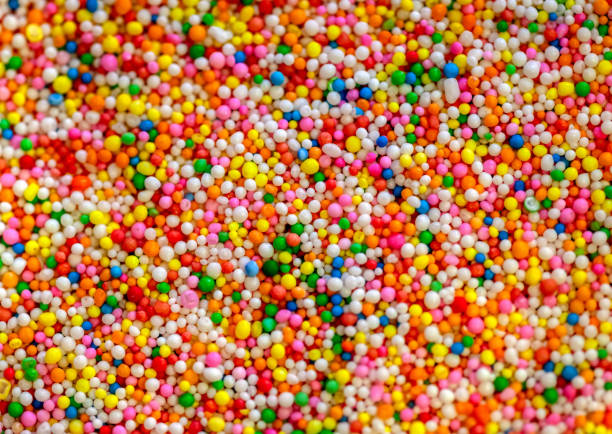 istock Texture sprinkle of multicolor rainbow candy 1183962822