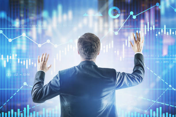istock Businessman working with digital graphs in city 1183966429