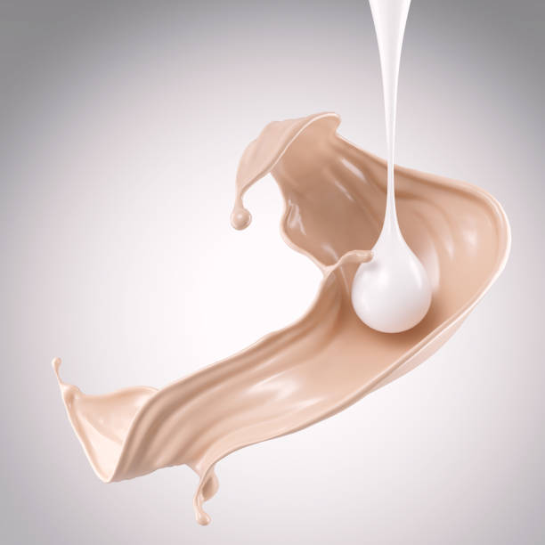 istock flow of liquid foundation splash with milk. 1183968775