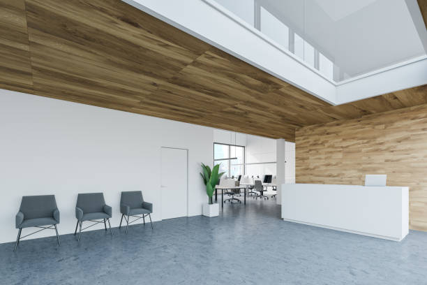 istock White and wooden office corner with reception 1183969788