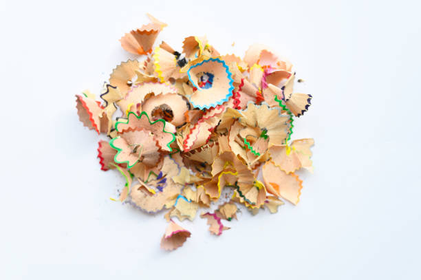 istock a bunch of colored pencil shavings on a white background 1183970139