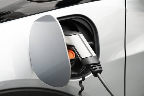 istock EV or Electric car at charging station plugged in 1183972393